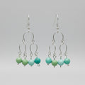 Silver chandelier dangle earrings with jade beads