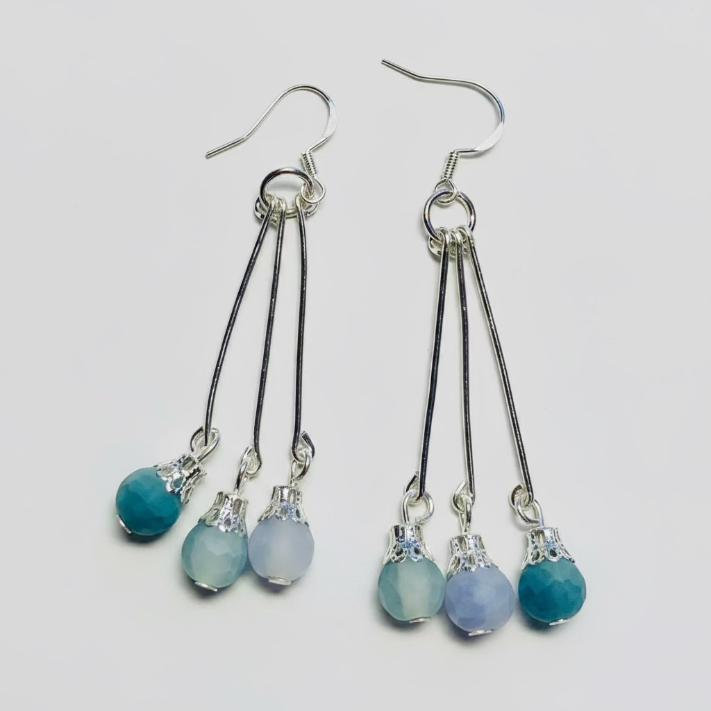 Sterling silver three dangle earrings with opaque blue stones