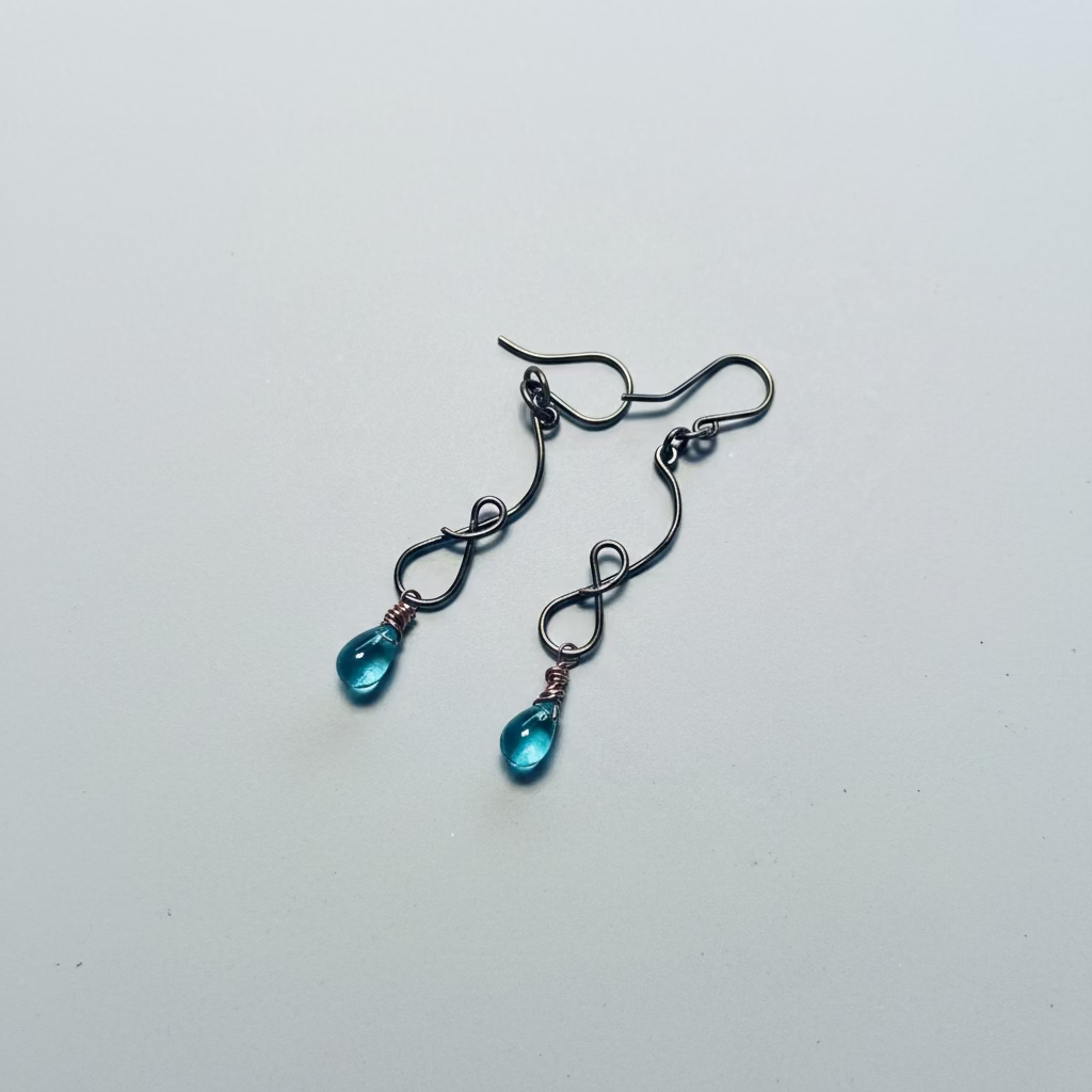 Bronze Curve Dangle Earrings – Green Teardrop