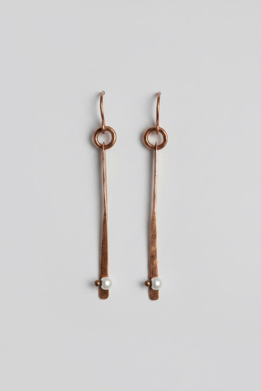 Copper 2' long dangle that has been hammered and pearls added